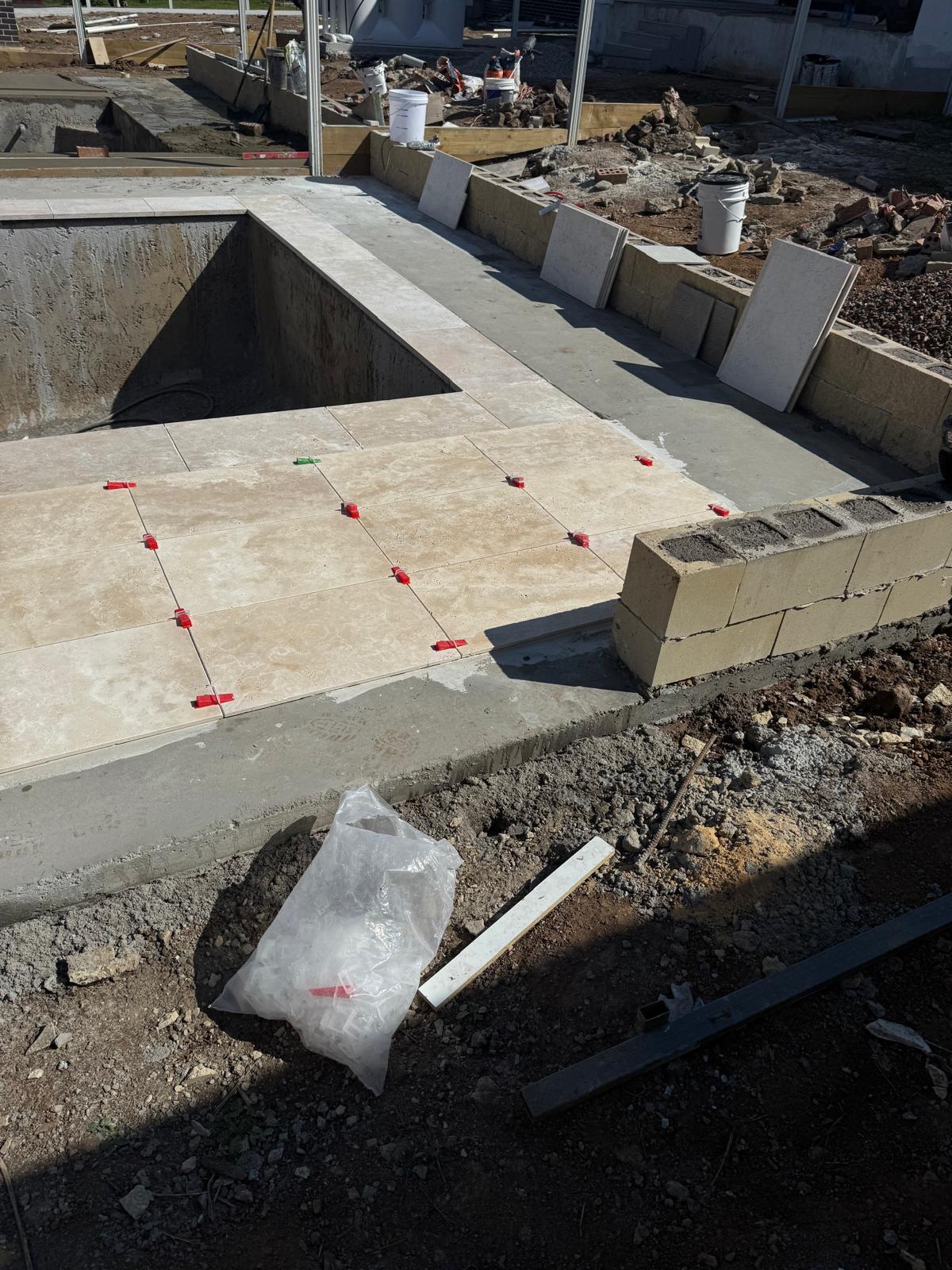 Pool coping and surround tiling